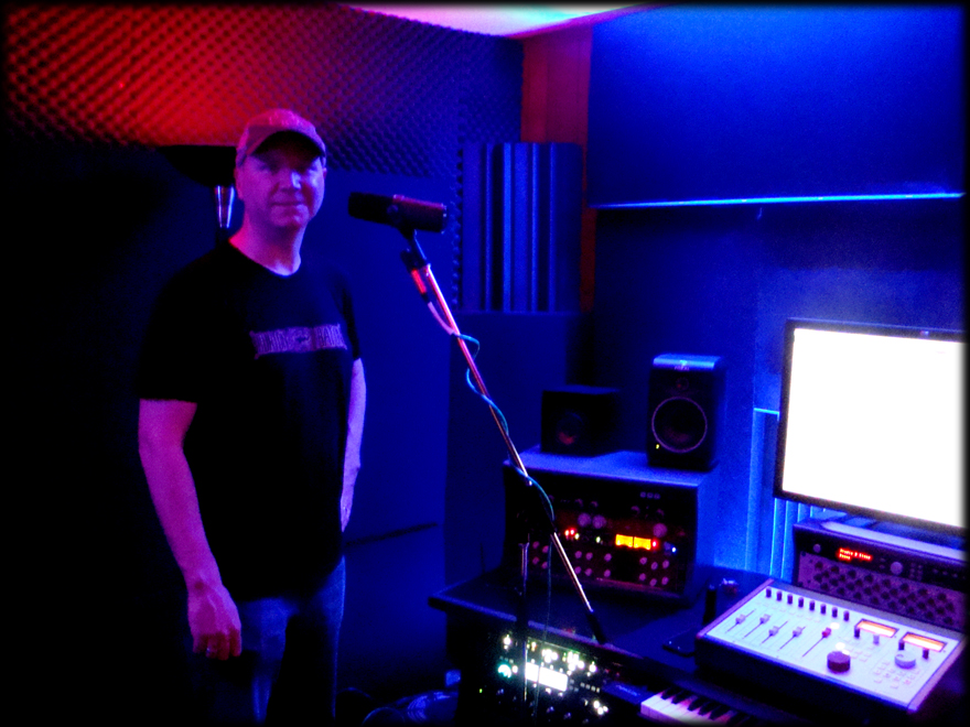 Monty Leach recording scratch vocals in the control room